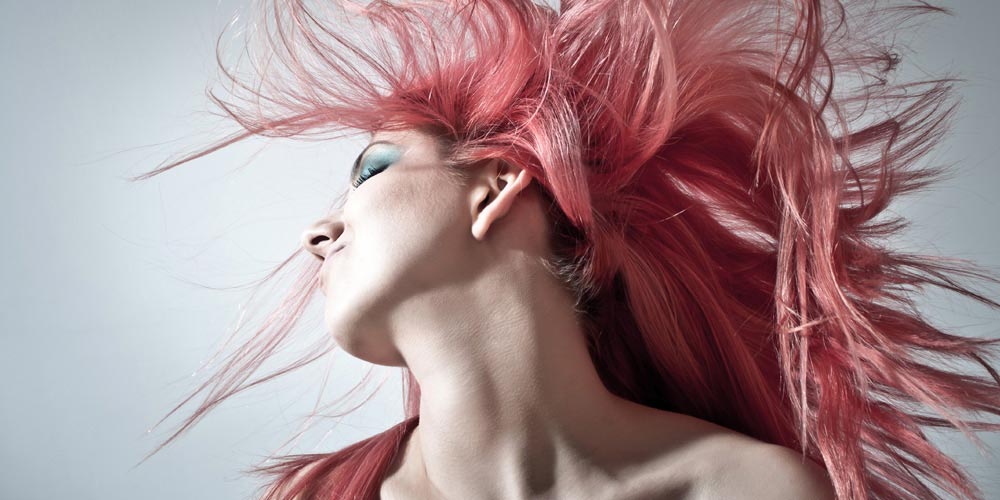 Woman with Red Tint in her Hair Shaking her Head Woman with Red Tint in her Hair Shaking her Head